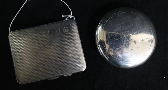 A 1940s silver tobacco box and a silver cigarette case.